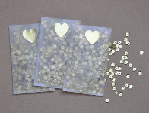 Found on Etsy https://www.etsy.com/uk/listing/128165981/gold-or-silver-sequins-wedding-favors?zanpid=2028329930643055616&utm_medium=affiliate&utm_source=zanox&utm_campaign=row_buyer&utm_content=2086109